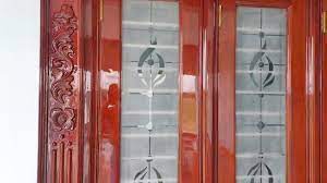 Expert technician performing Doors Polish Work for a smooth finish